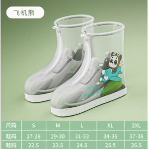 Los ni&ntilde;os usan fundas de zapatos de lluvia antideslizantes y resistentes al desgaste fuera de las fundas de zapatos de lluvia impermeables.